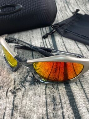 Oakley Sunglasses - Silver Frame with Orange-Red Mirrored Lenses